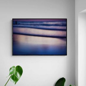 Akustik billede Blurry fisherman 120x80 cm
